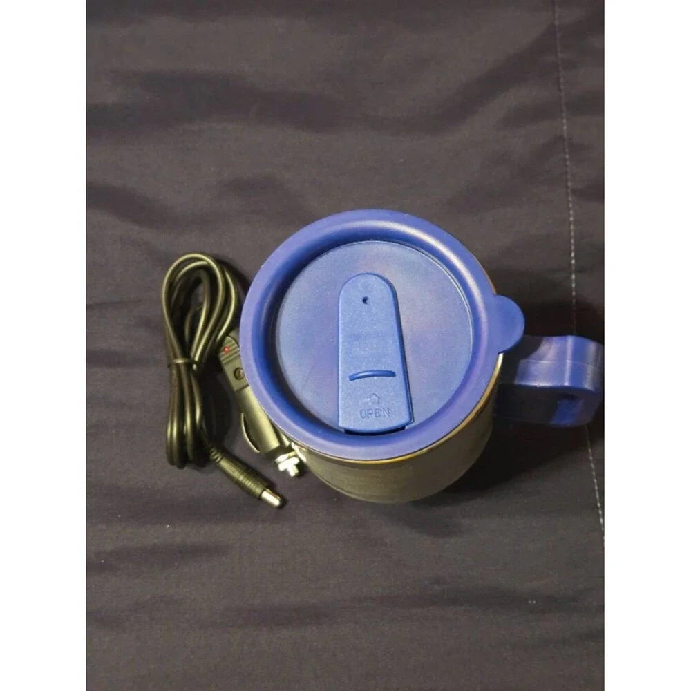 HEATED STAINLESS STEEL COFFEE MUG.